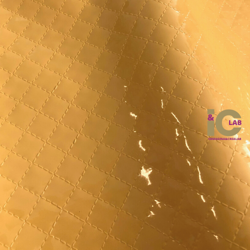 FINTA PELLE TRAPUNTATA GIALLO