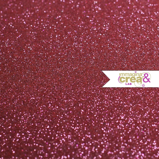 POLVERE DI GLITTER ROSA ACCESO